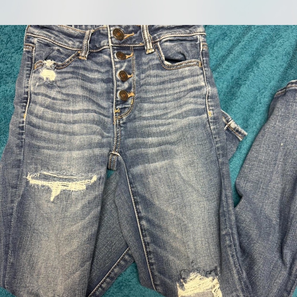 Women's Distressed Blue Jeans